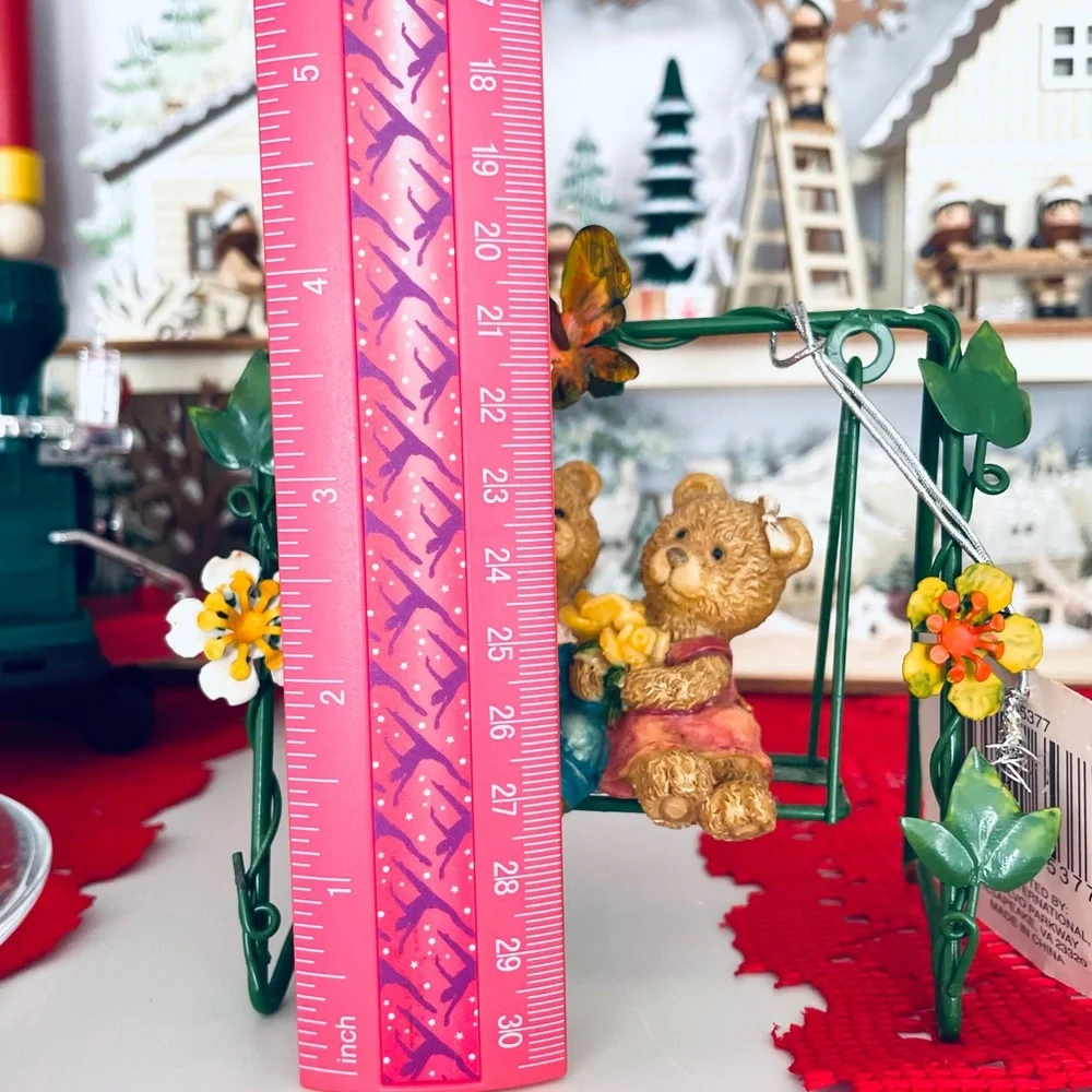 Vintage Green Bear Swing Figurine with Yellow and Red Accents